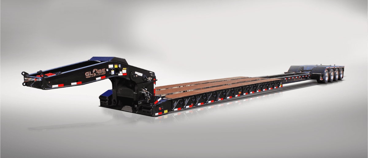 Black extendable removable gooseneck trailer stretched out with hydraulic flip axle down