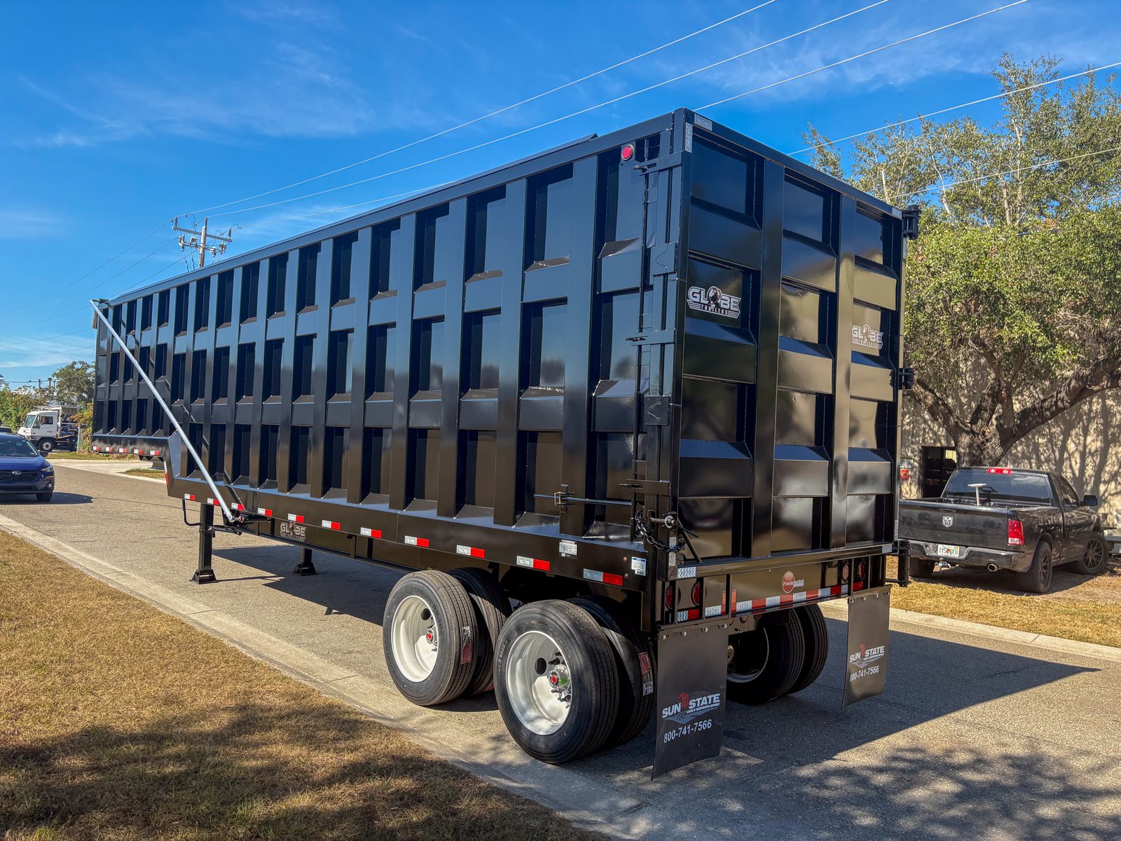 Globe 75 yard dump trailer side and front profile