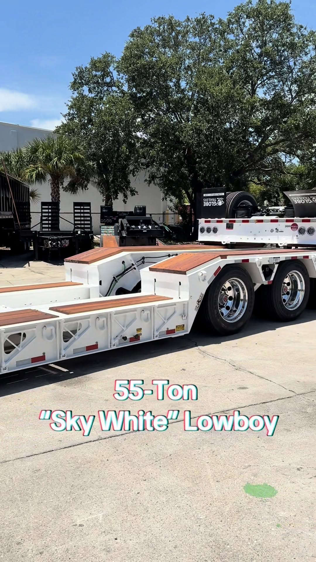 Turning heads and hauling heavy - check out our Sky White 55-Ton Lowboy thumbnail
